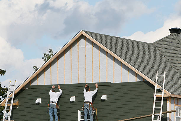 Professional Emergency Siding Repair technician working in Linden, NC